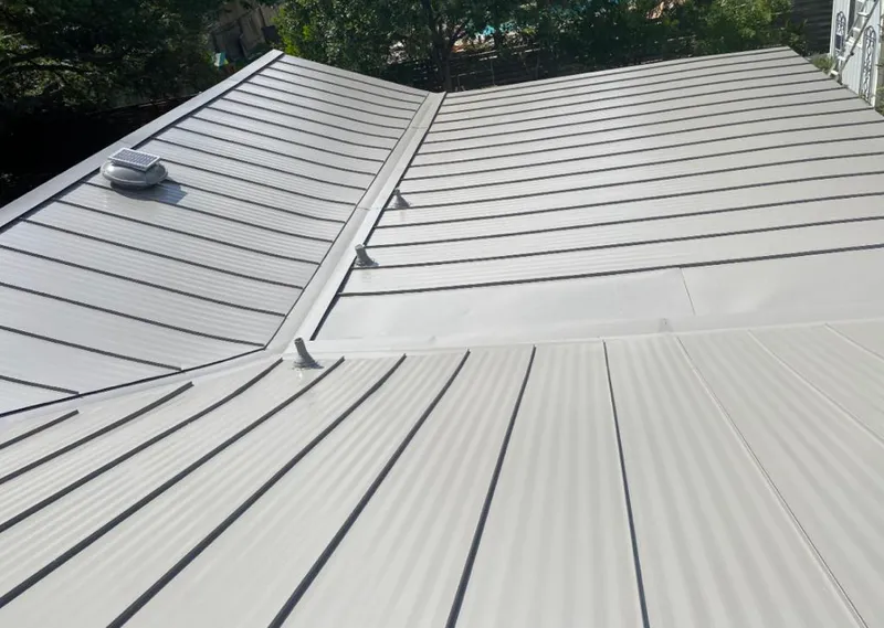 Solar attic fan installed on a metal roof for Roof Ventilation in Mira Monte